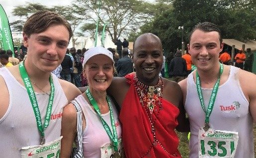 Runners wearing their medals after the Safaricom Marathon