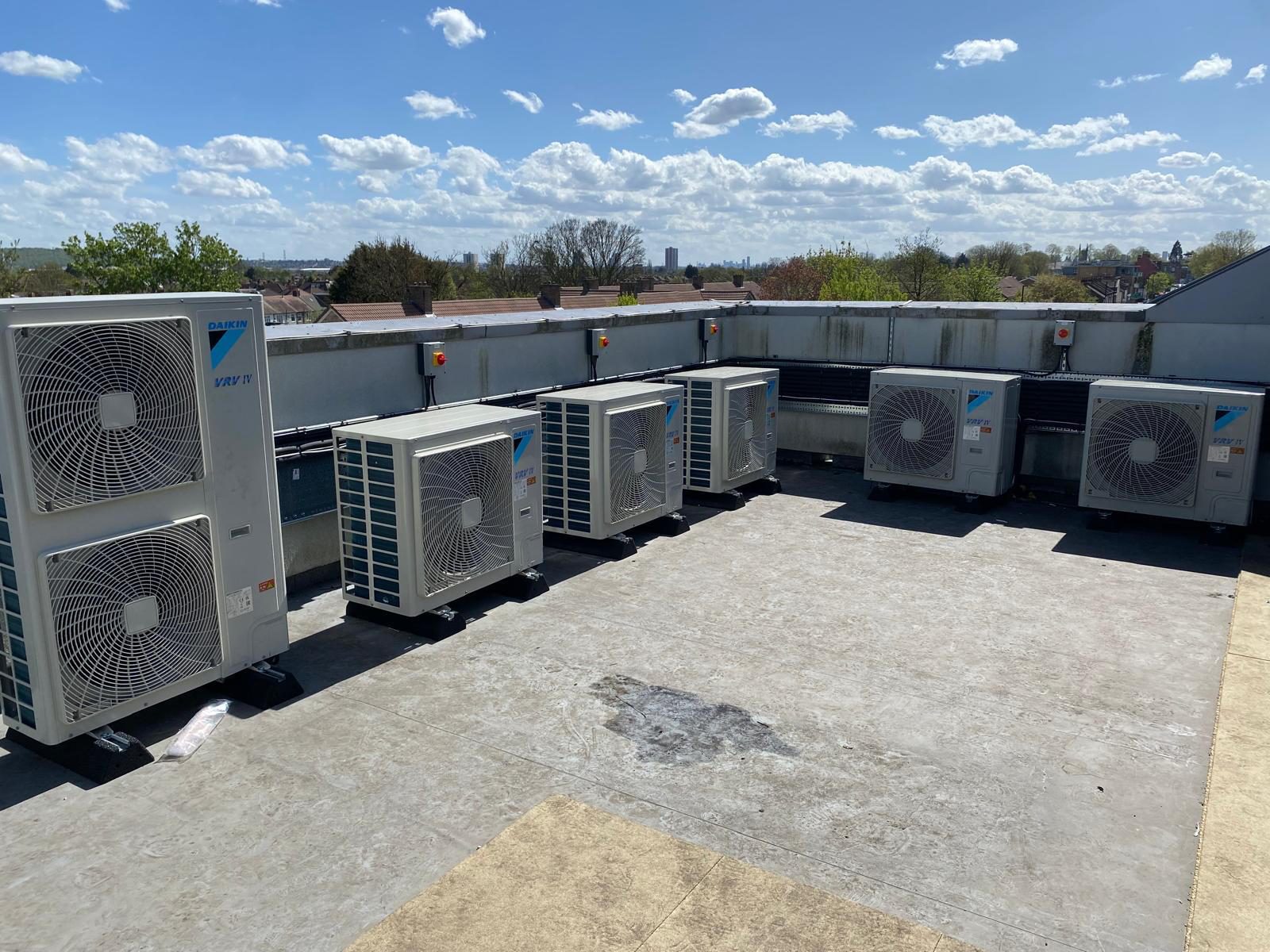 Daikin outdoor units on the roof at Bridgewood House