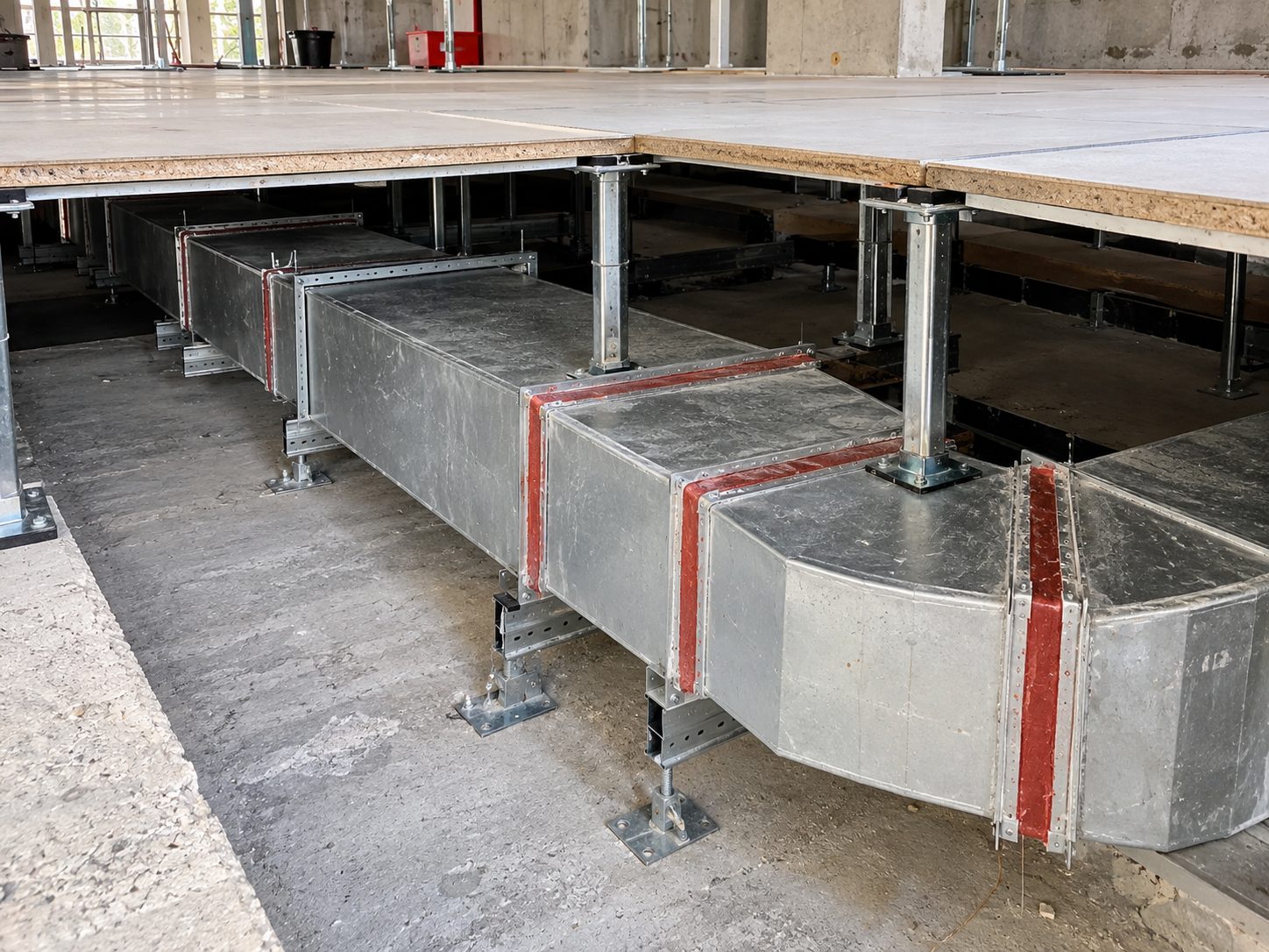 Fire-rated ductwork beneath a raised floor at the Greenhouse Centre