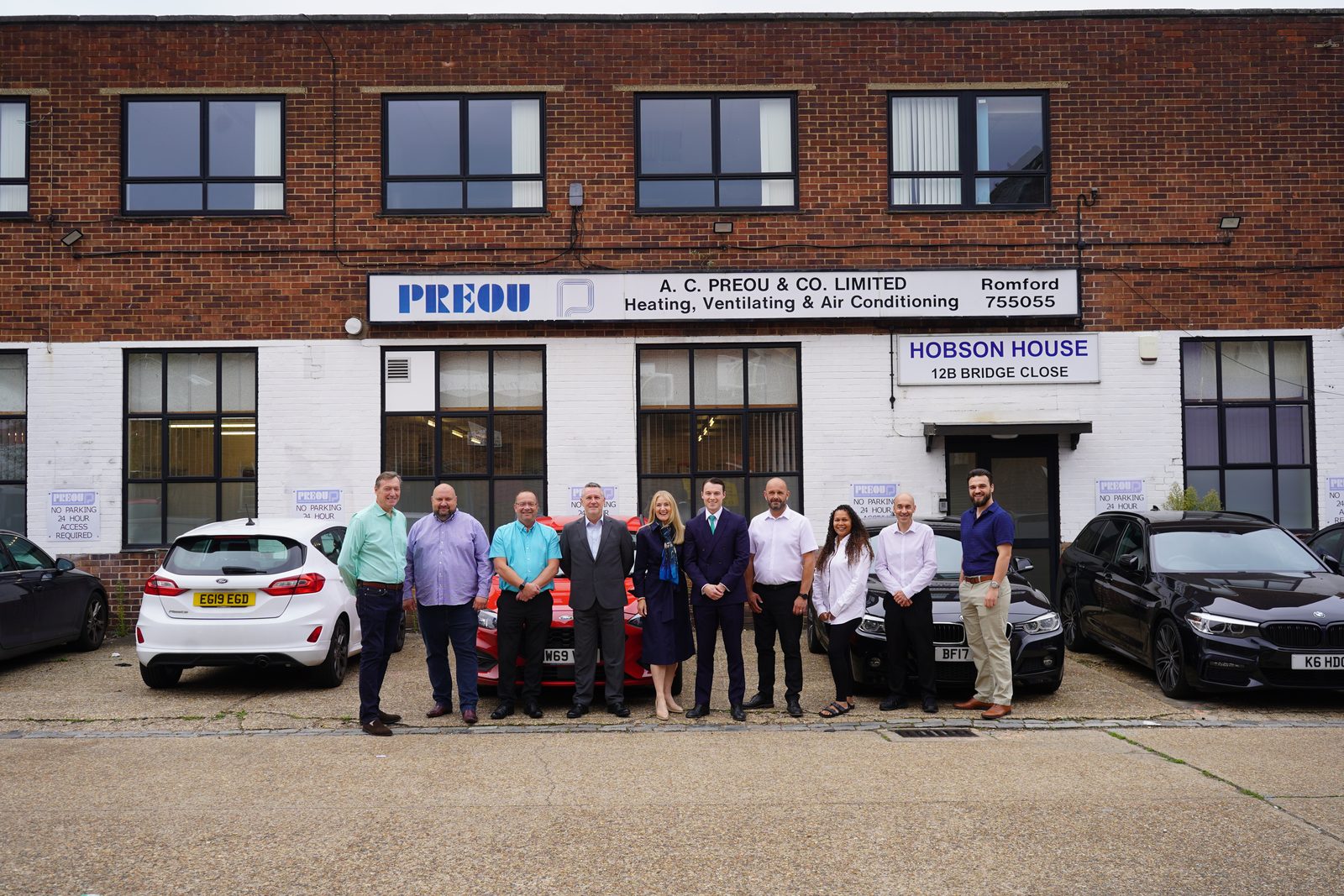 The team outside the Bridge Close offices in Romford