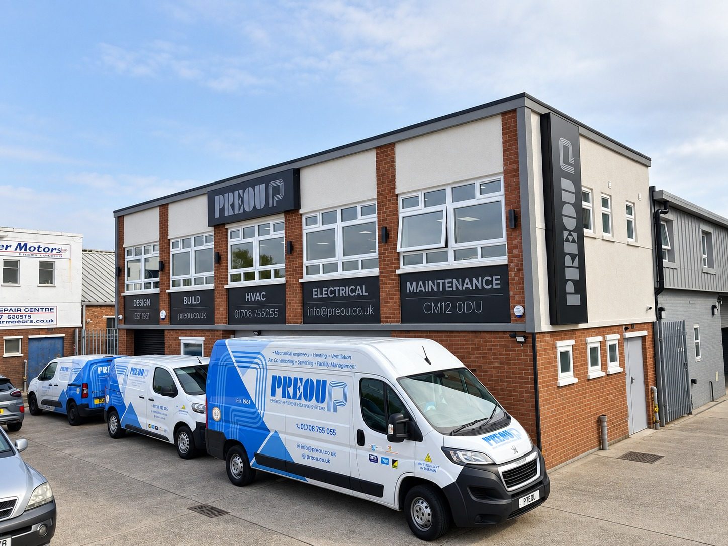 The Preou offices at 8 Radford Crescent, Billericay, with Preou vans parked outside